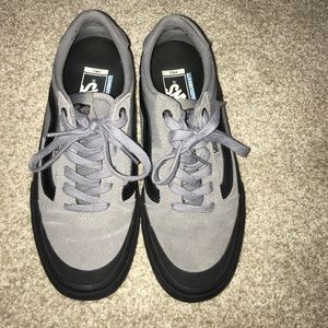 Grey and black vans pro